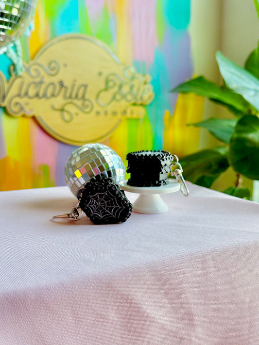 Spider Coffin Cake Clicker Keychain