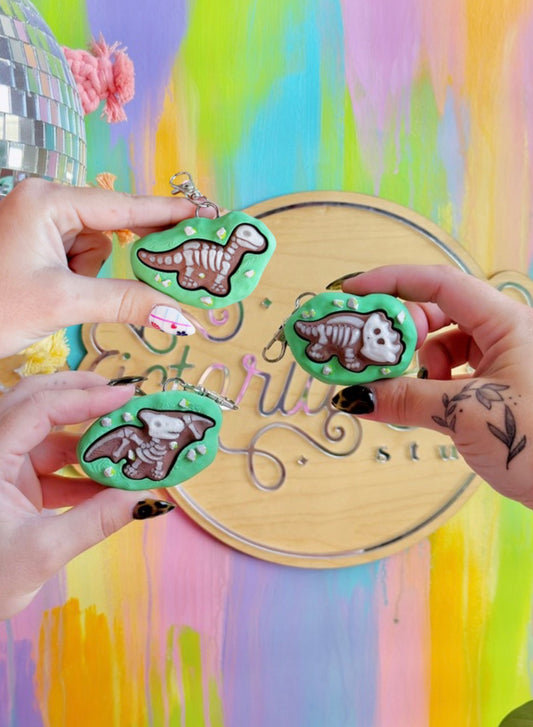 Dino Fossil Clicker Keychain (glow in the dark)